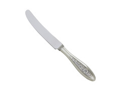 Серебряный столовый нож с цветочным узором на ручке  